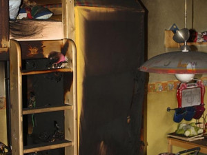 Dětský pokoj bytu na Pražské třídě po požáru