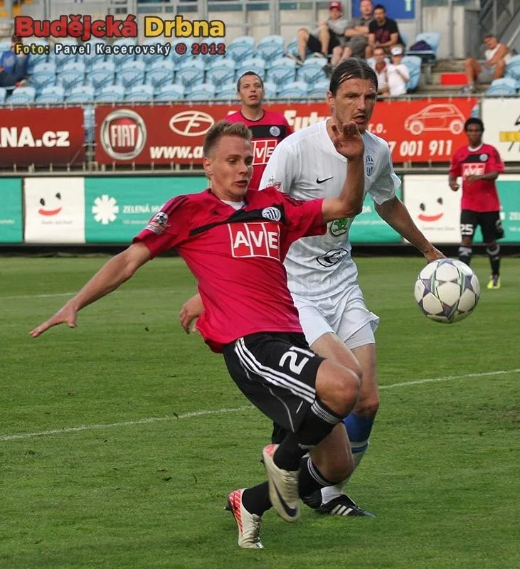 František Němec před Adrianem Rolkem