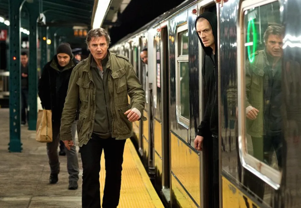 Liam Neeson jako Jimmy v Nočním běžci