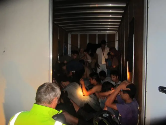 Fotografie ze zadržení migrantů