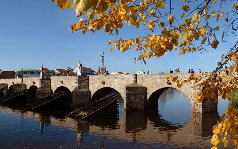 Písek.