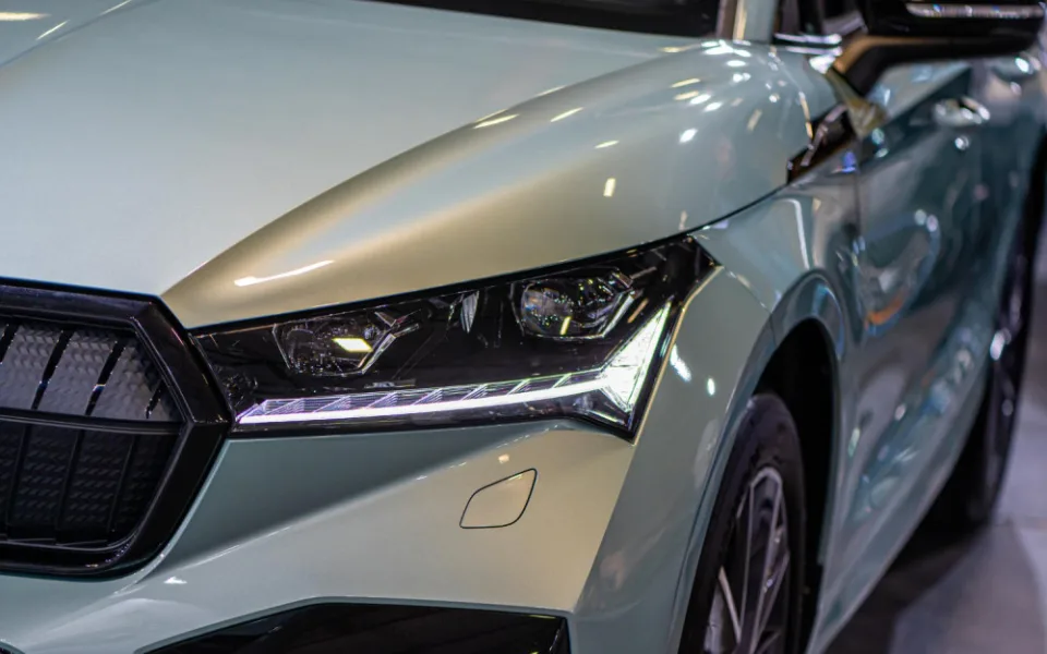 riga-latvia-sep-24-2021-skoda-enyaq-iv-electric-suv-premiere-motor-show-full-led-headlights-closeup